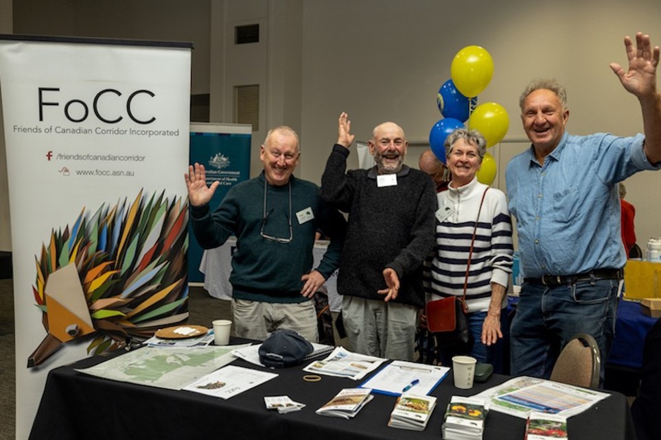 Group celebrates at Friends of Canadian Corridor event.