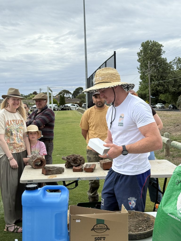 Community workshop on gardening techniques and materials.