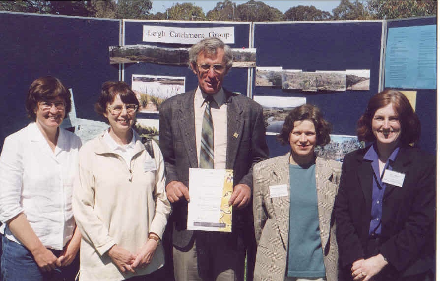 Leigh Catchment Group members with a certificate.